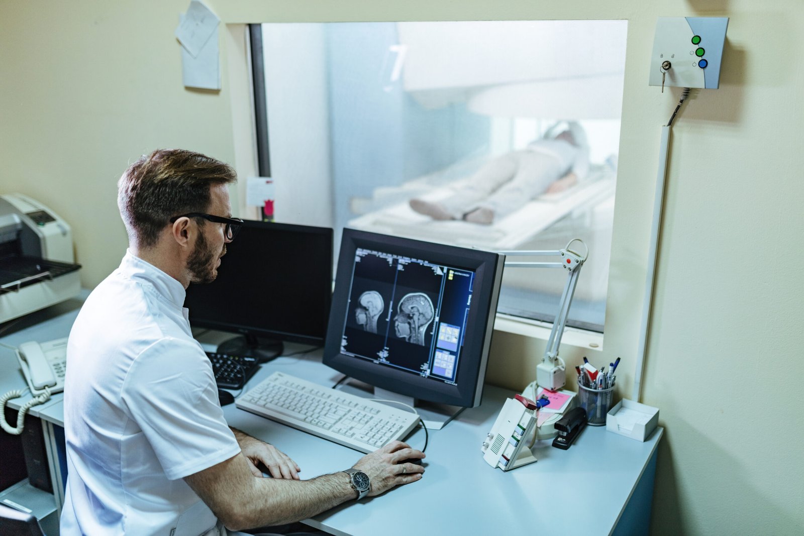 Radiologist analyzing MRI scan at one of the best diagnostic clinics in Montreal